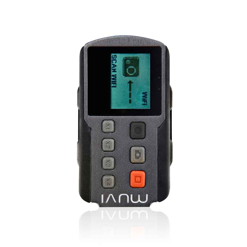 Veho | Comando Remoto Wi-Fi Muvi K Dispositivo electrónico compacto preto com ecrã LCD e botões cinzentos e laranja