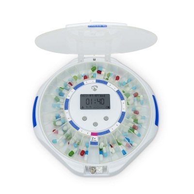 Dispensador eletrónico de comprimidos redondo com cápsulas coloridas e ecrã digital