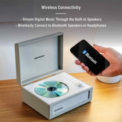 Leitor de CD CROSLEY branco com disco e smartphone com símbolo Bluetooth