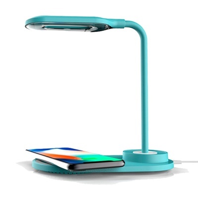 Lamp lamp with smartphone on turquoise base