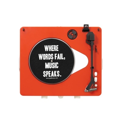 Gira-discos vermelho com frase motivacional no prato preto