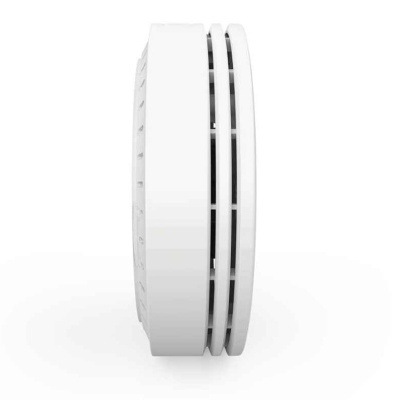 Detetor de fumo redondo branco visto de perfil