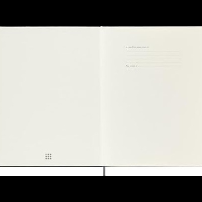 Caderno aberto com páginas em branco