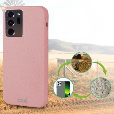 Capa de smartphone cor-de-rosa com textura pontilhada e texto 'cool' em fundo de campo com fardos de palha