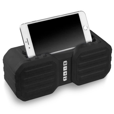 Coluna de som preta com suporte para smartphone