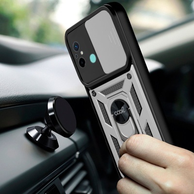 Telemóvel com capa protetora cinzenta e suporte metálico para carro