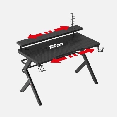 Secretária preta com tampo e prateleira superiores em fibra de carbono, estrutura metálica preta e setas vermelhas indicando ajuste.