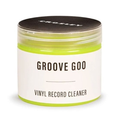 frasco plástico com líquido verde-limão e etiqueta Groove Goo Vinyl Record Cleaner