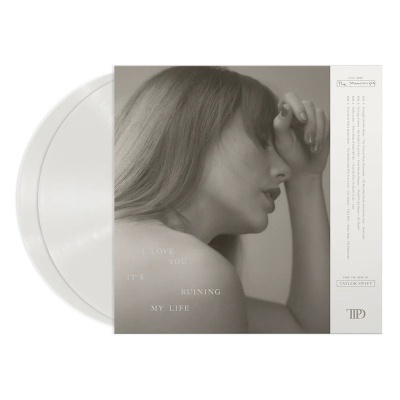 Disco de vinil branco com capa com fotografia de mulher e texto em inglês