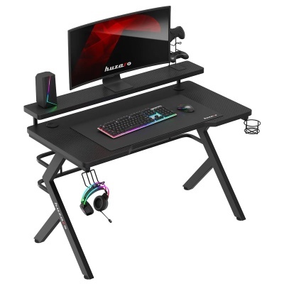 Mesa de gaming preta com suporte elevado para monitor e acessórios RGB