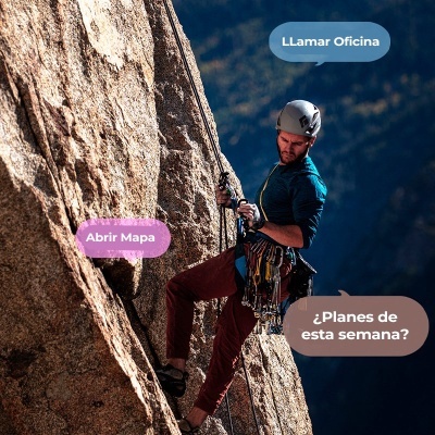 Homem a escalar rocha com equipamento de segurança e caixas de texto digitais