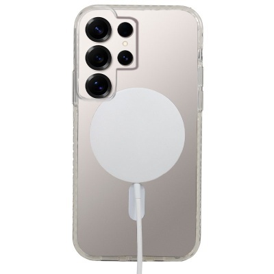 Smartphone prateado com capa transparente e carregador magnético branco na traseira