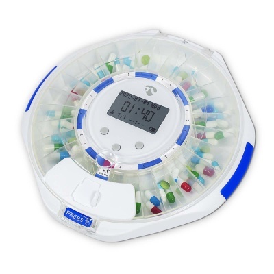 Distribuidor automático de comprimidos redondo com cápsulas coloridas e mostrador digital