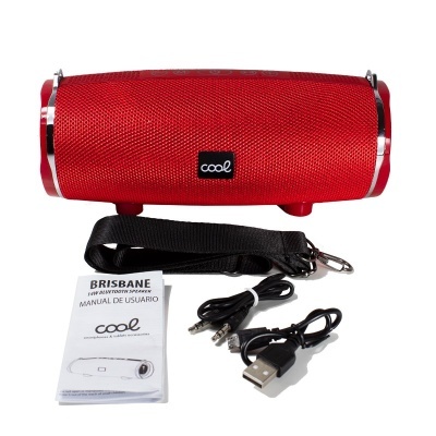 Coluna de som portátil vermelha com acessórios e manual