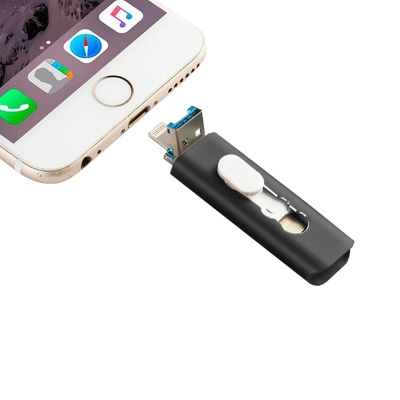 Smartphone branco com pen USB preta com tampa deslizante branca ao lado