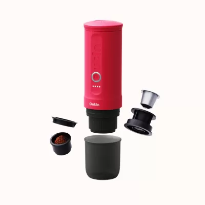 Máquina de café portátil vermelha Outlin com cápsulas de café e copo preto