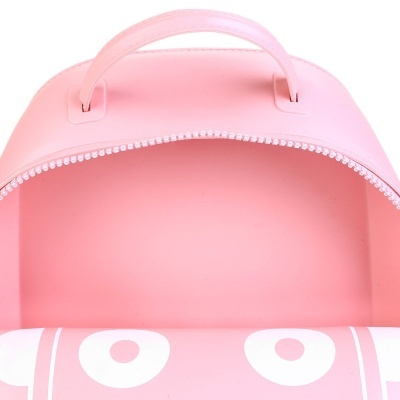 mochila rosa clara com padrão branco de olhos estilizados