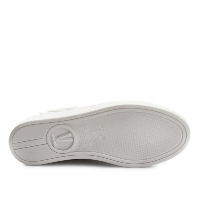 Sola de sapato branca com textura e gravações