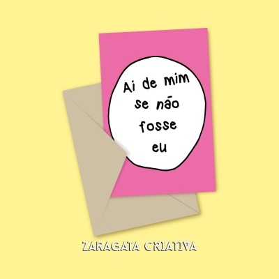 Cartão rosa com texto 'Ai de mim se não fosse eu' e envelope bege sobre fundo amarelo