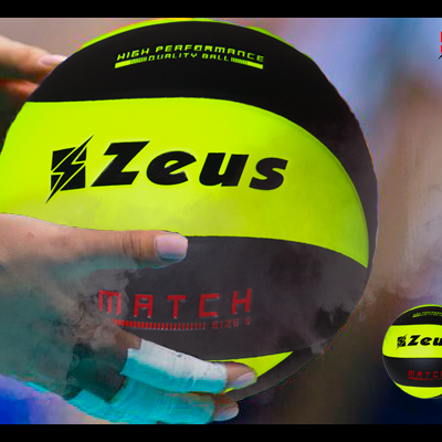 Bola de voleibol amarelo-fluorescente e preta da Zeus com mãos segurando.