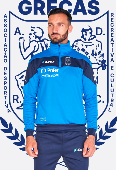 Fato de treino azul com detalhes em azul escuro e logótipos do clube GRECAS