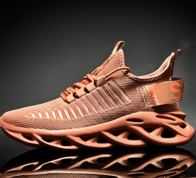 ténis desportivo cor de salmon com sola geométrica vazada